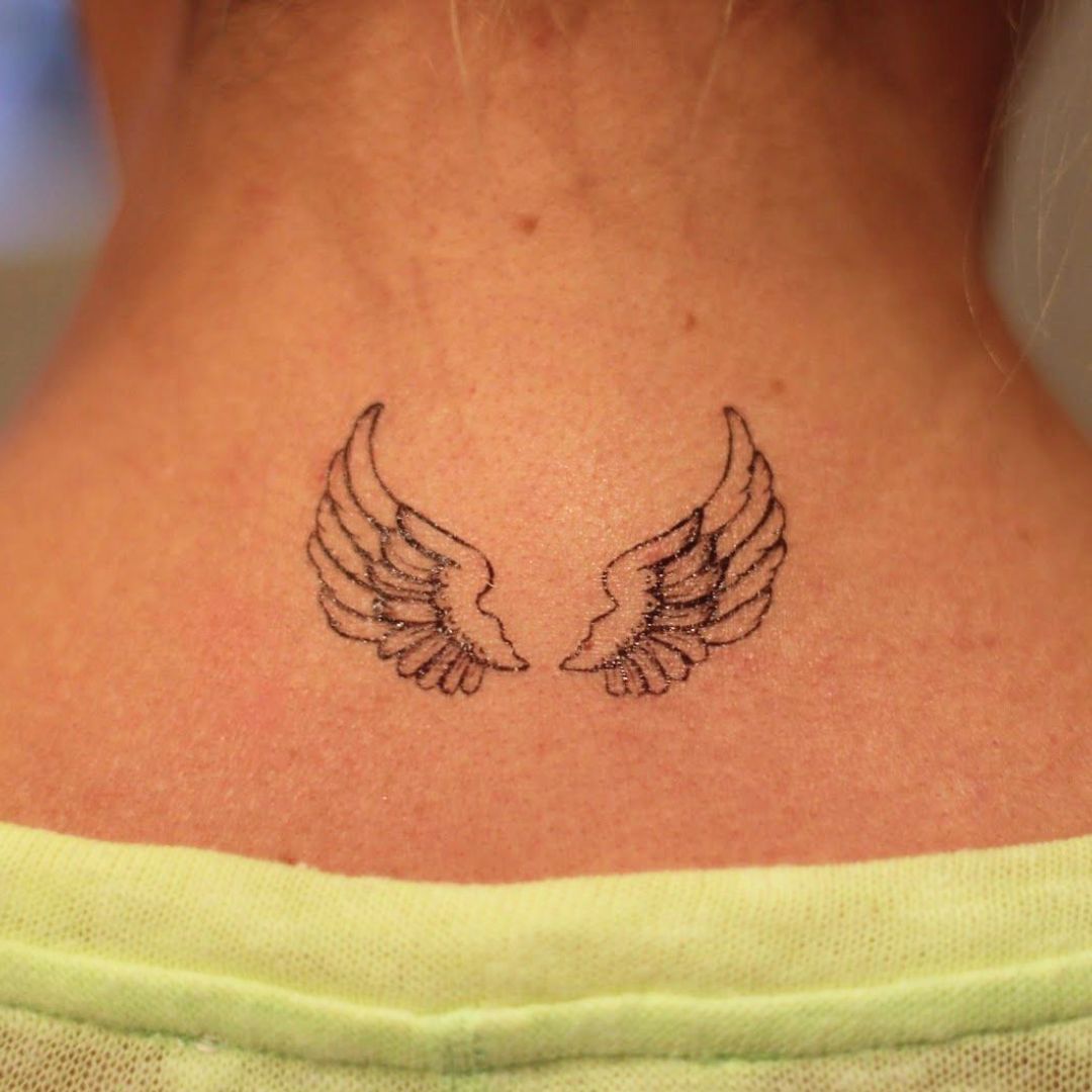 Wing tattoos - Temporalis